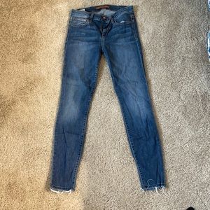 Lighter wash distressed jeans